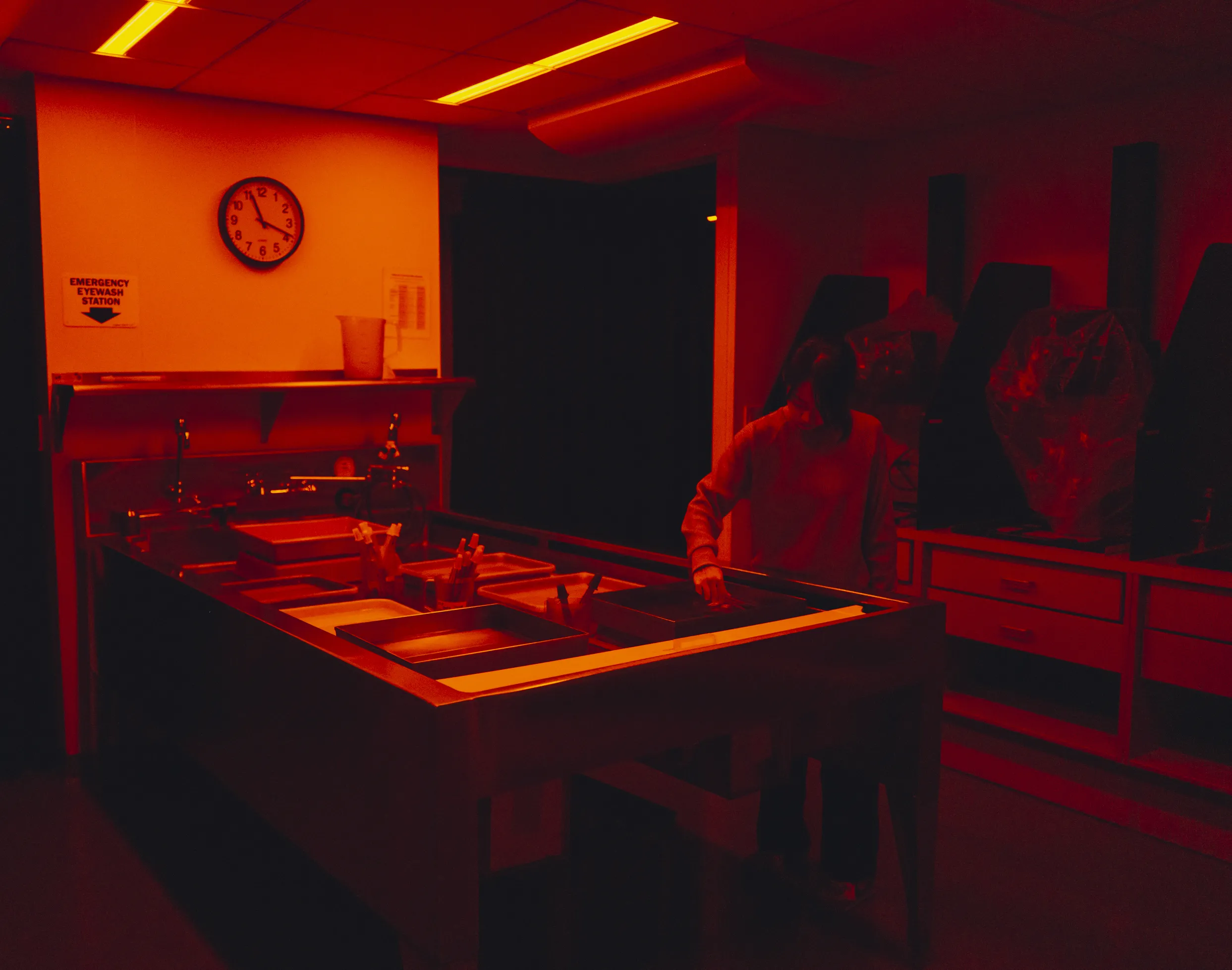 Student working in darkroom