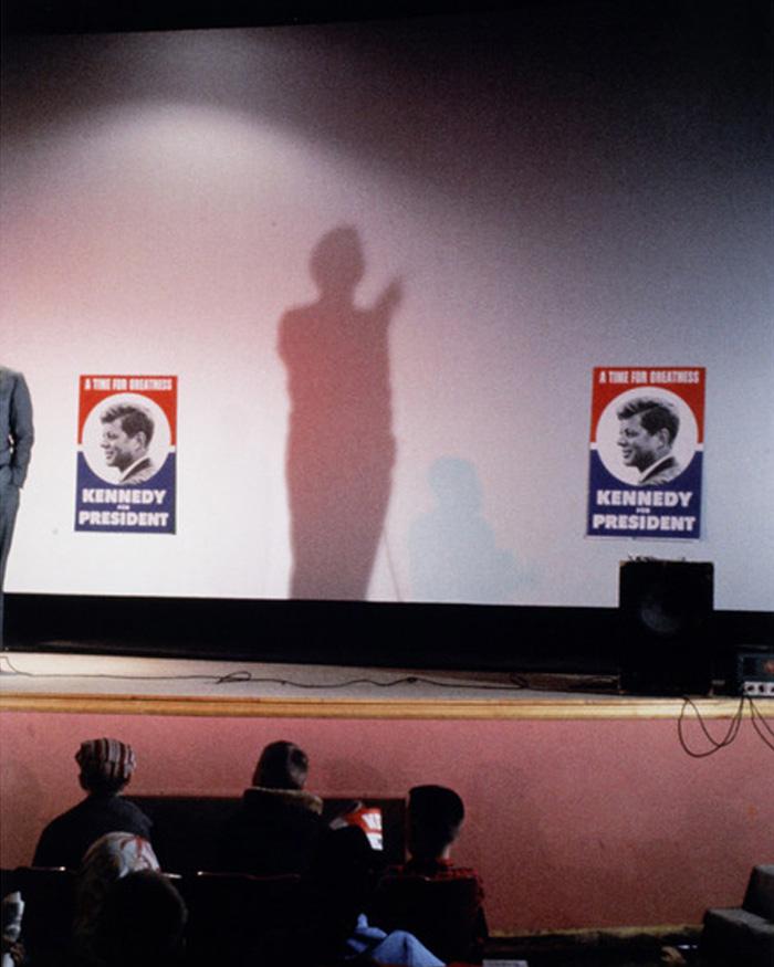 The shadow of a person in stage.