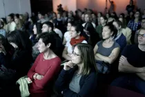 A group of people at a lecture.