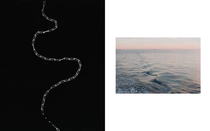 Cropped ocean view of waves alongside a snaking trail of paper clips attached to one another. 