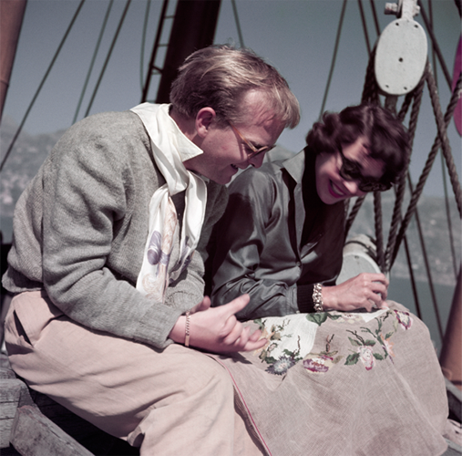 Two women laughing outside.